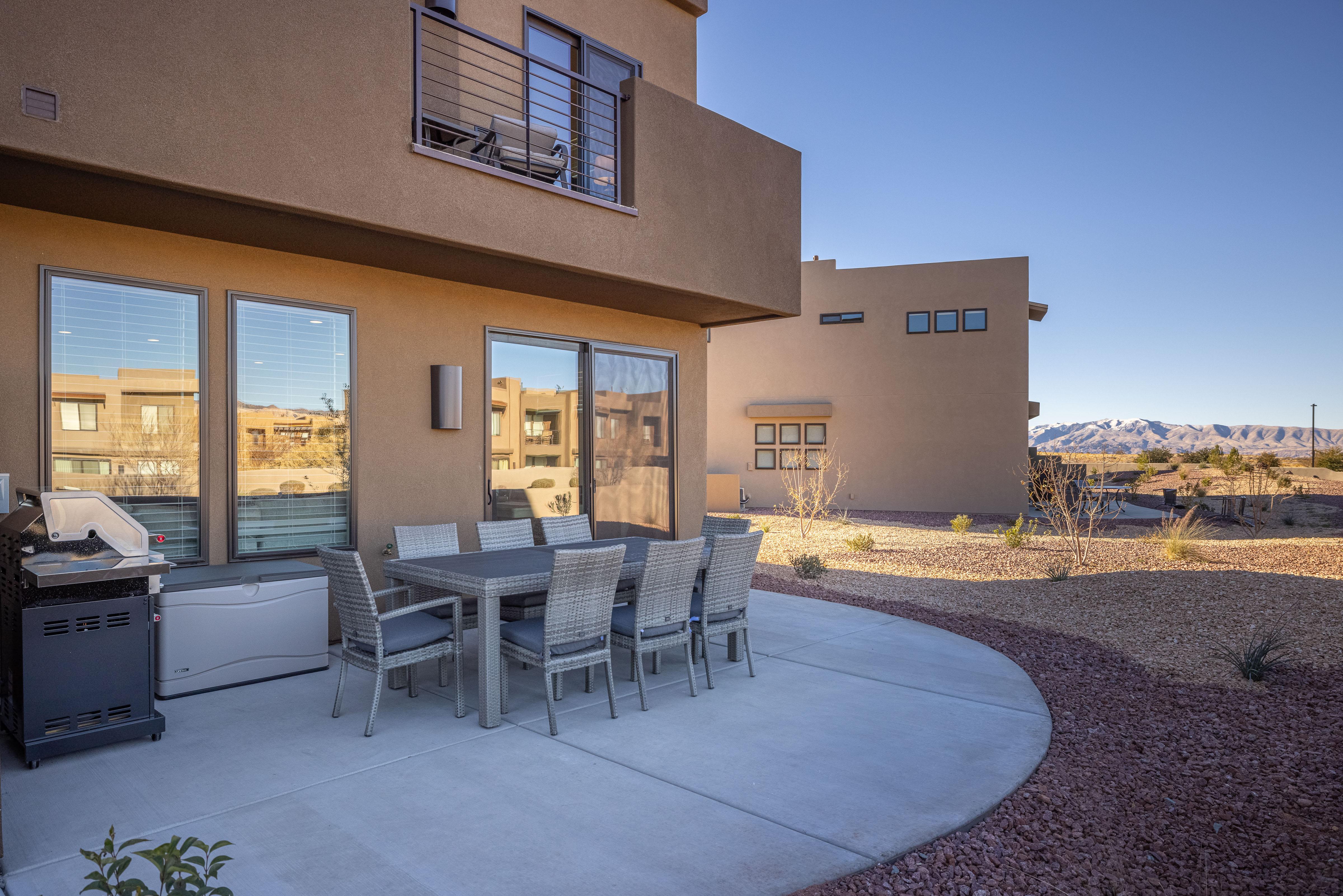 The Back Patio includes an outdoor dining table, BBQ grill, and sliding glass door that leads into the living room.