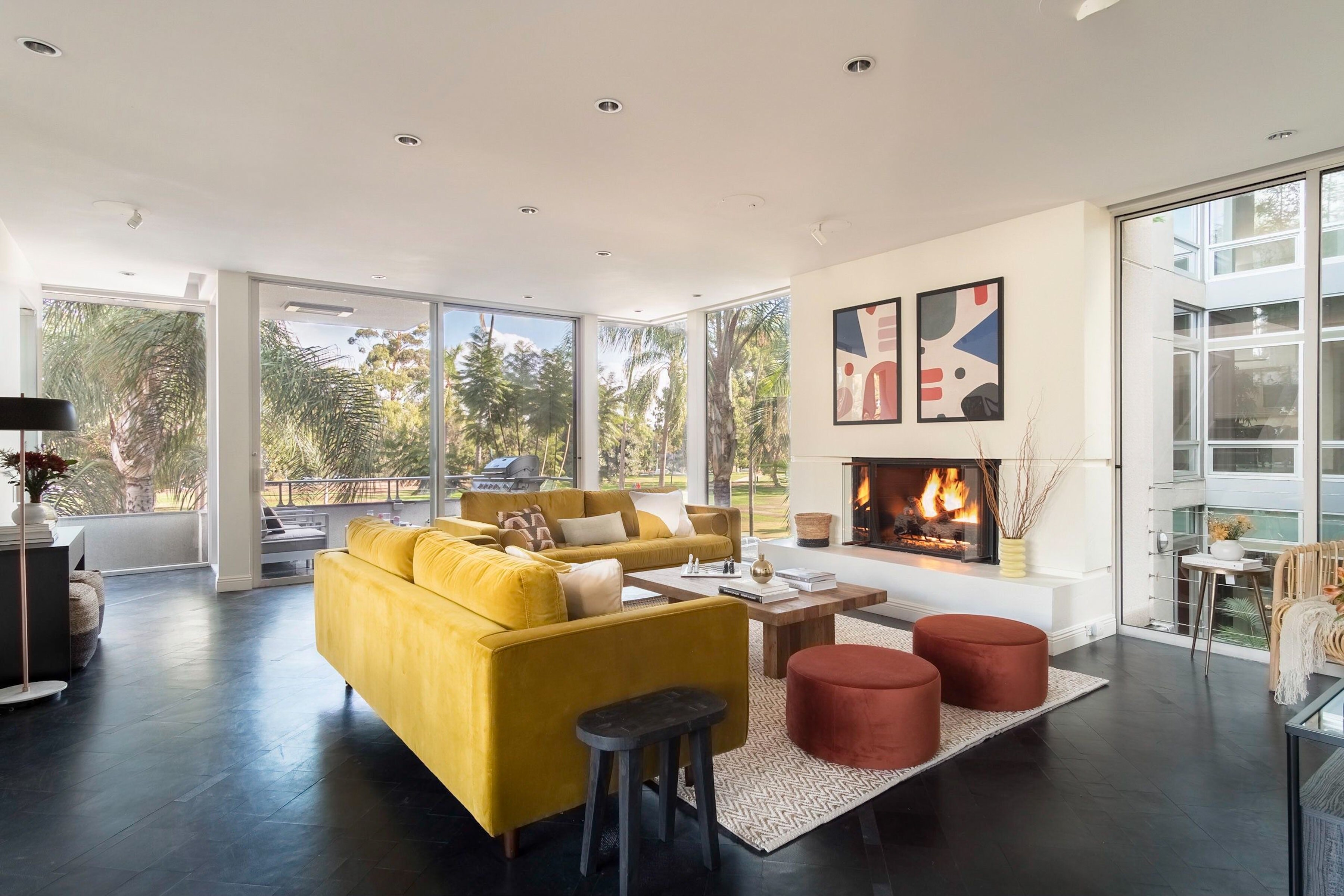 Welcome to Balboa Buyout! Stunning open living room with a fireplace in Balboa I.