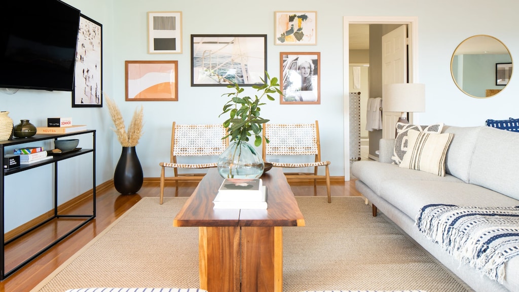 Living room features a beautiful gallery wall.