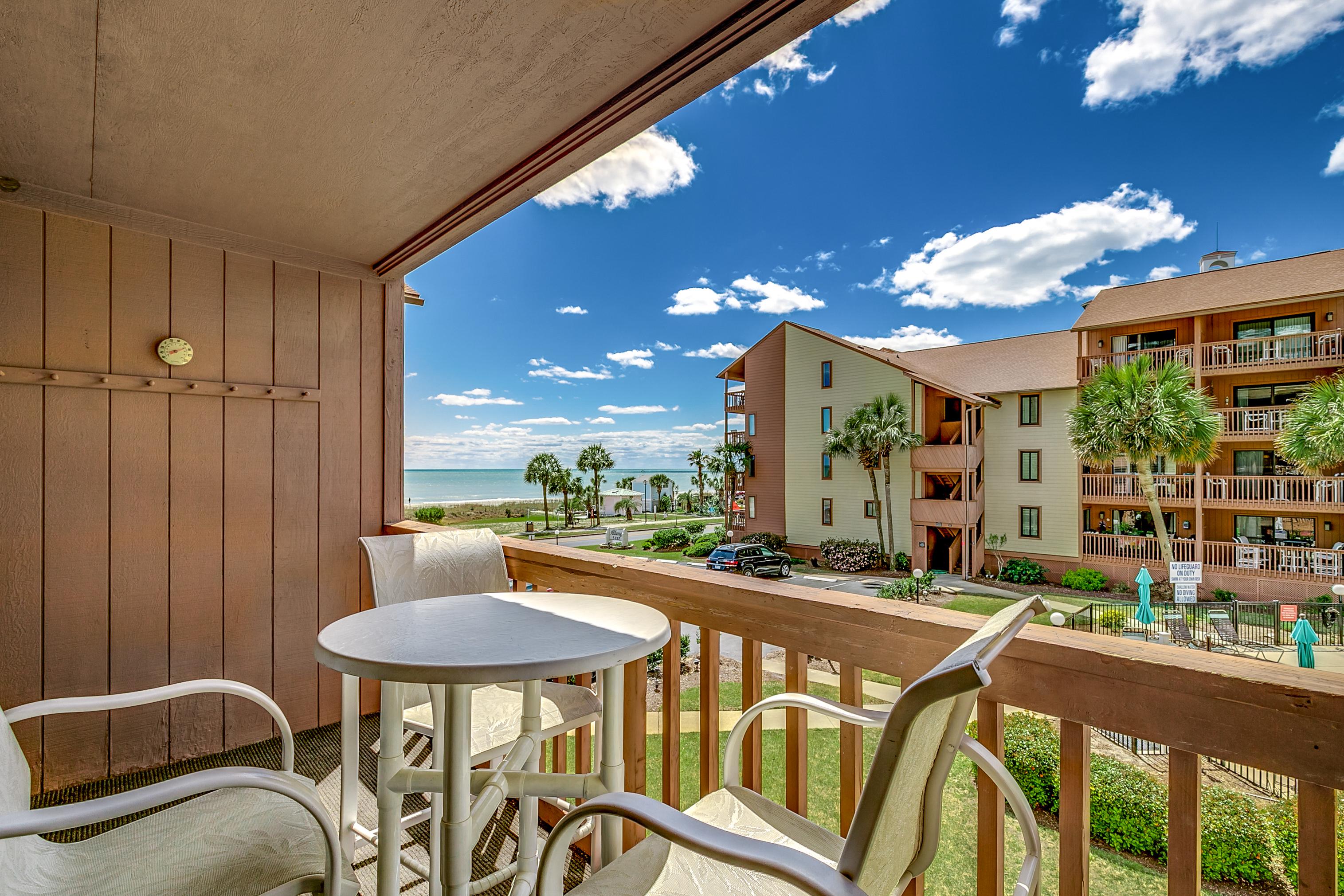 Property Image 2 - Elegant, Spacious Condo with Pool View Balcony; Near Beach