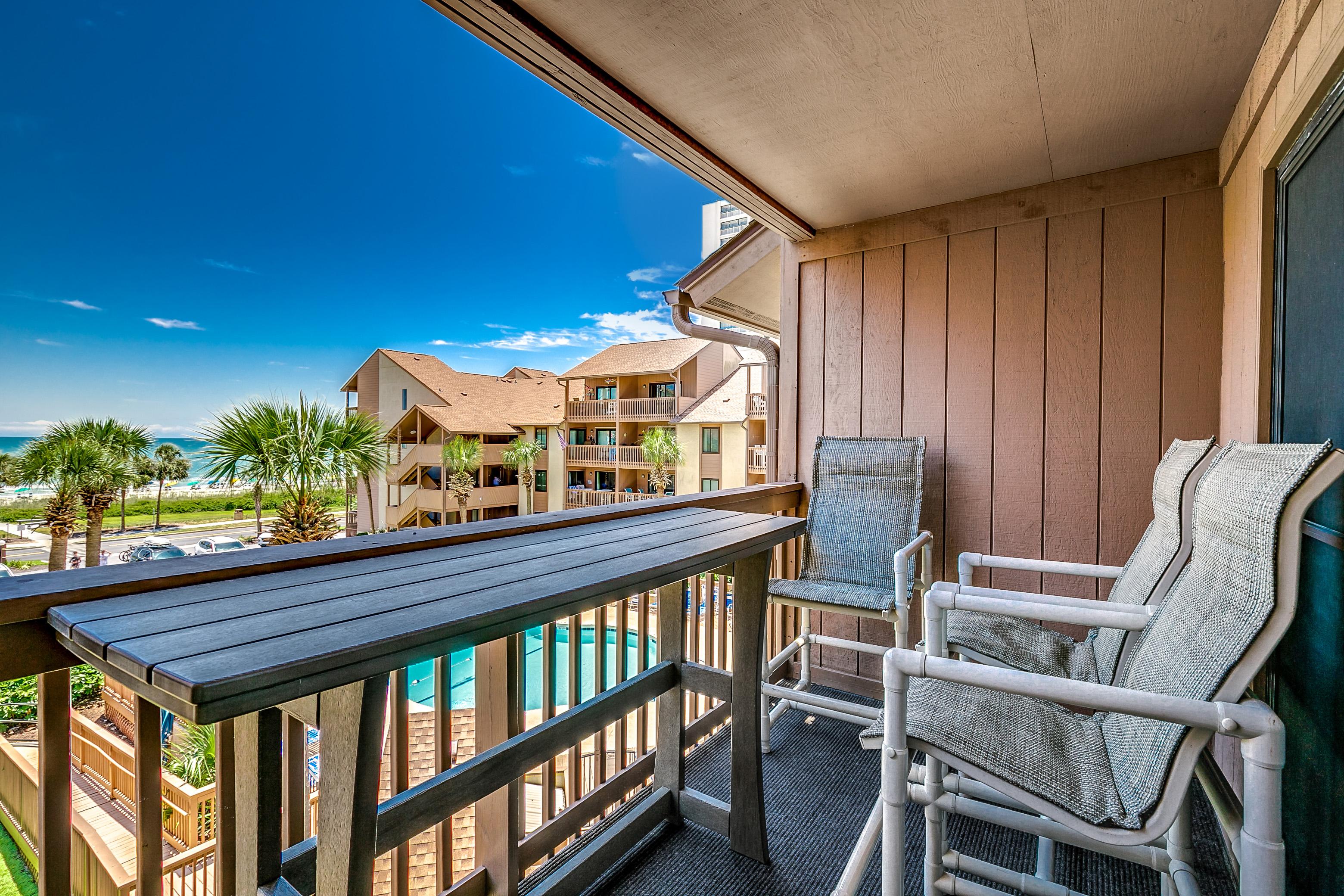 Property Image 1 - Stylish Condo with Two Balconies & View of Pool & Ocean