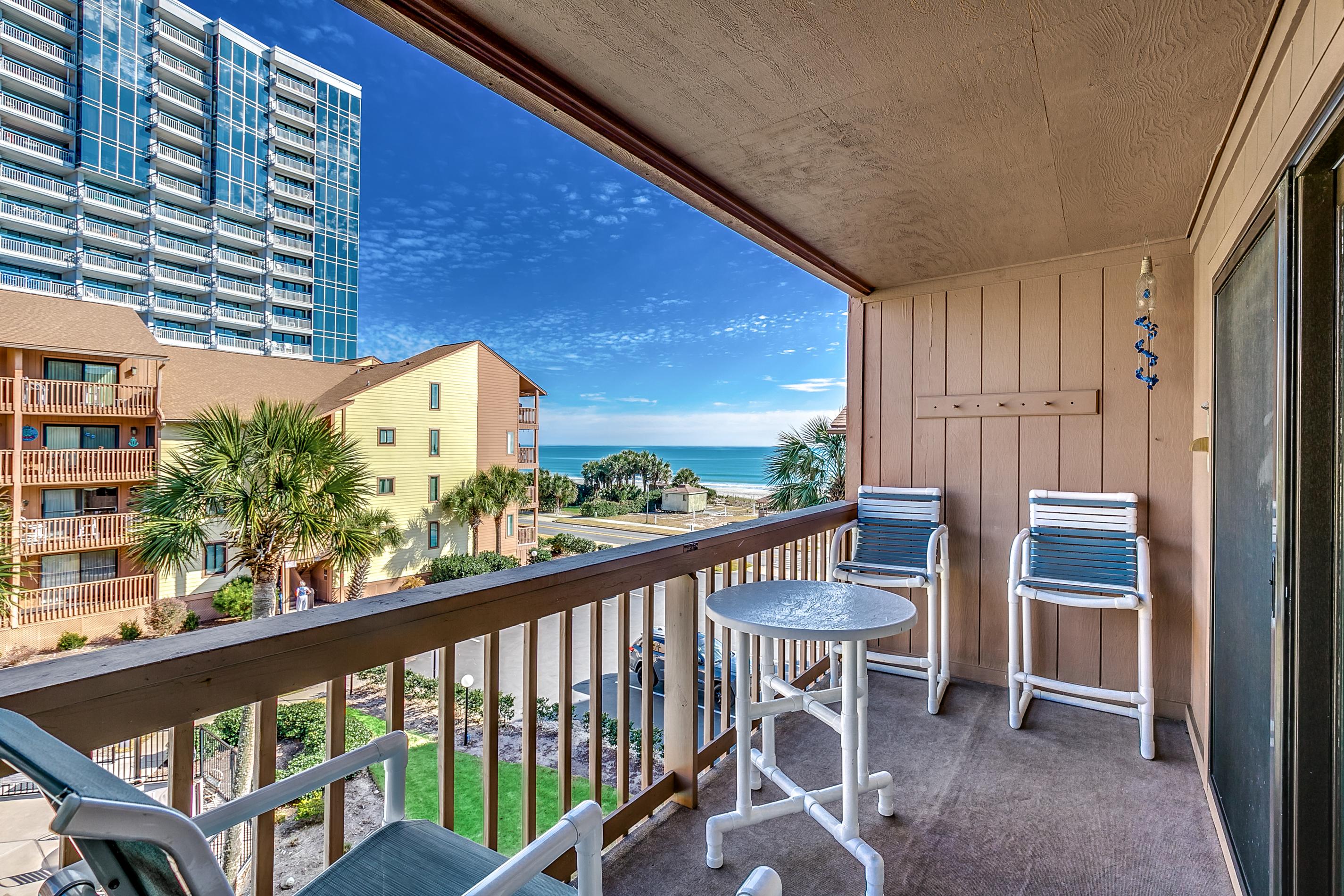 Property Image 1 - Stylish, Modern Condo with Two Balconies & Pool View; Near Beach