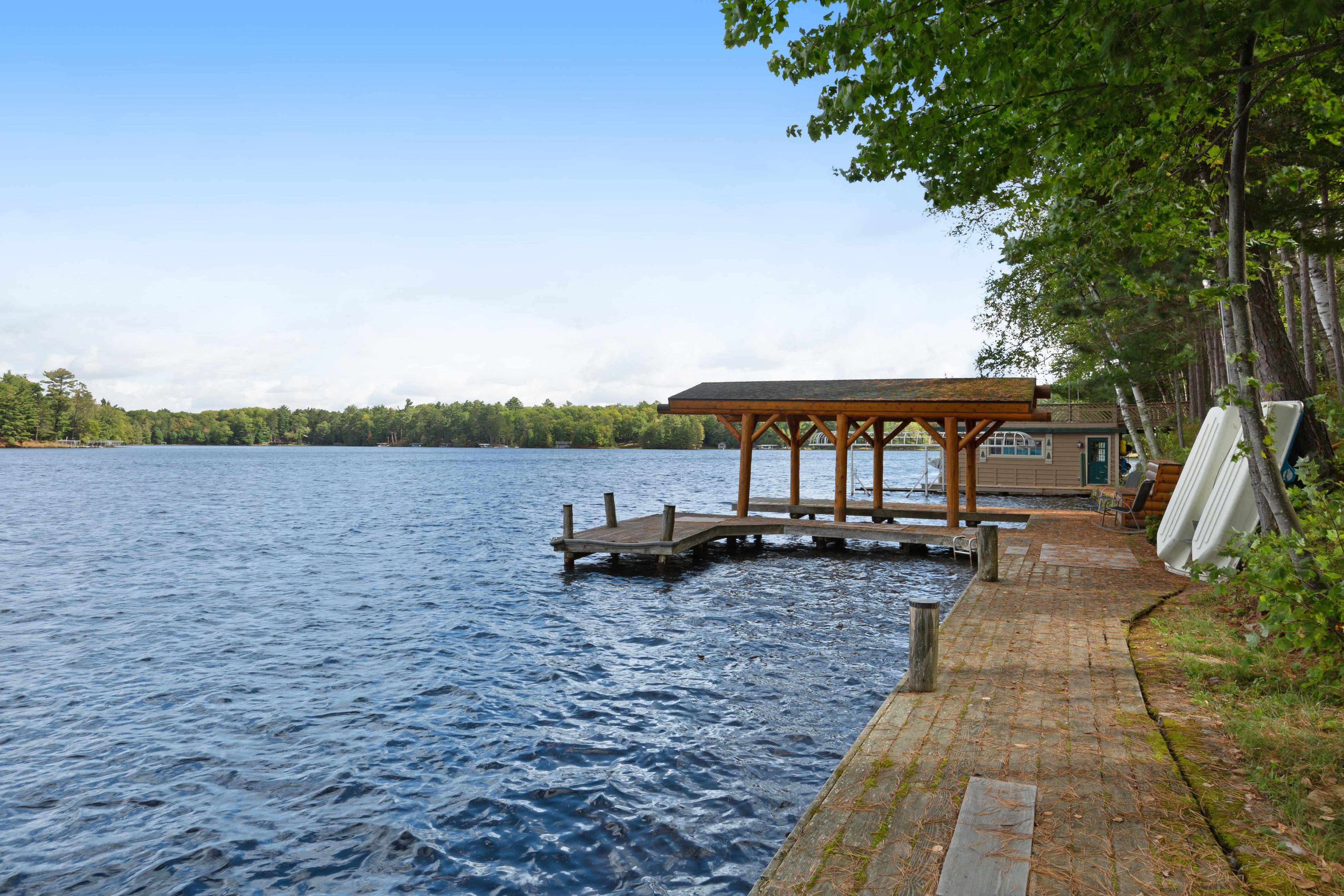 Property Image 2 - rustic charming home with incredible stone lake view - sauna & private patio