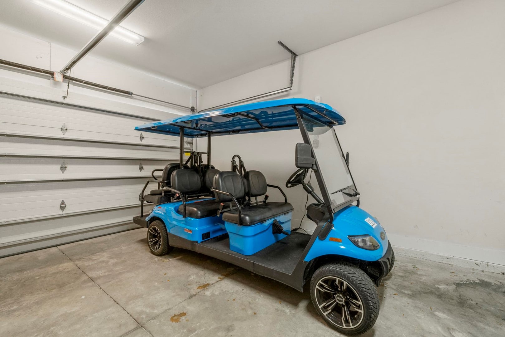 6 Seater Golf Cart Included with Your Rental!