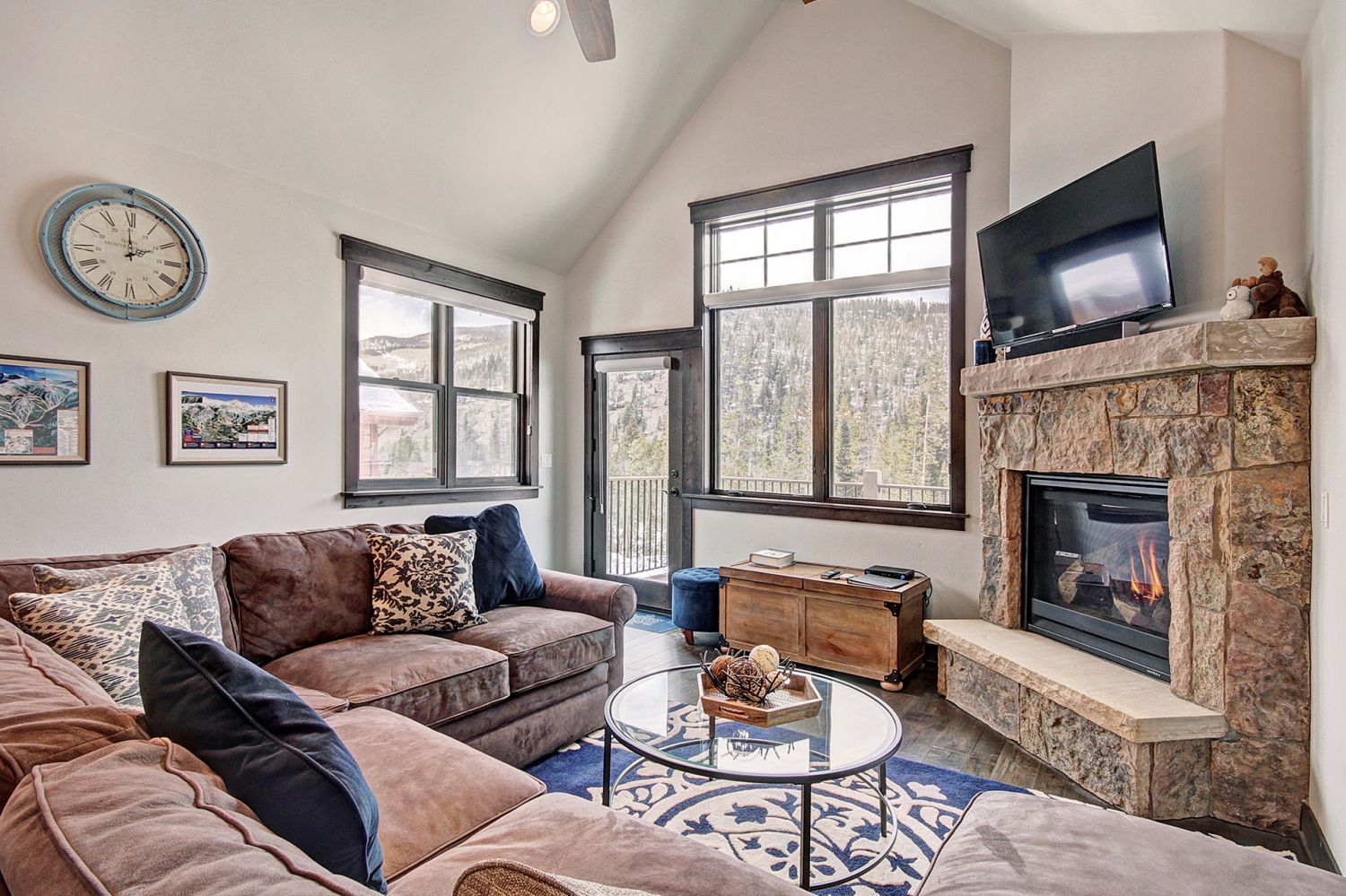 Living Room - Gas fireplace and large windows. Living Room - Gas fireplace and large windows.
