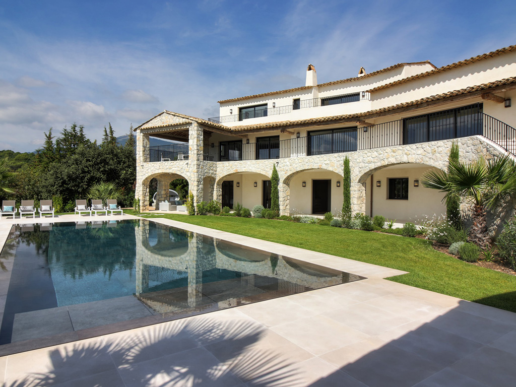 Property Image 2 - Sleek, Sun-Lit Villa with Heated Pool, Gardens & Sea View