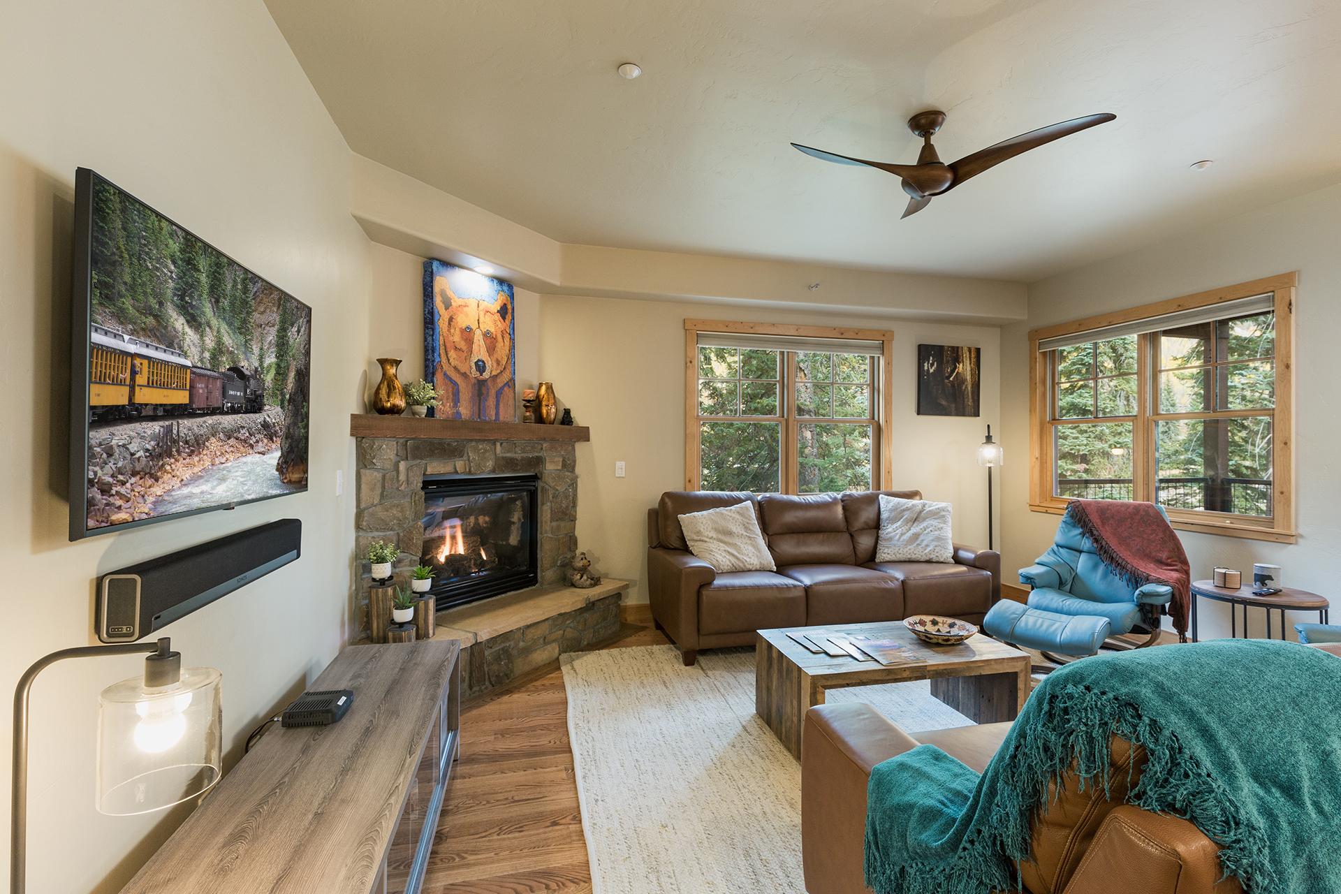 Main Living Space - Gas Fireplace, TV and Deck