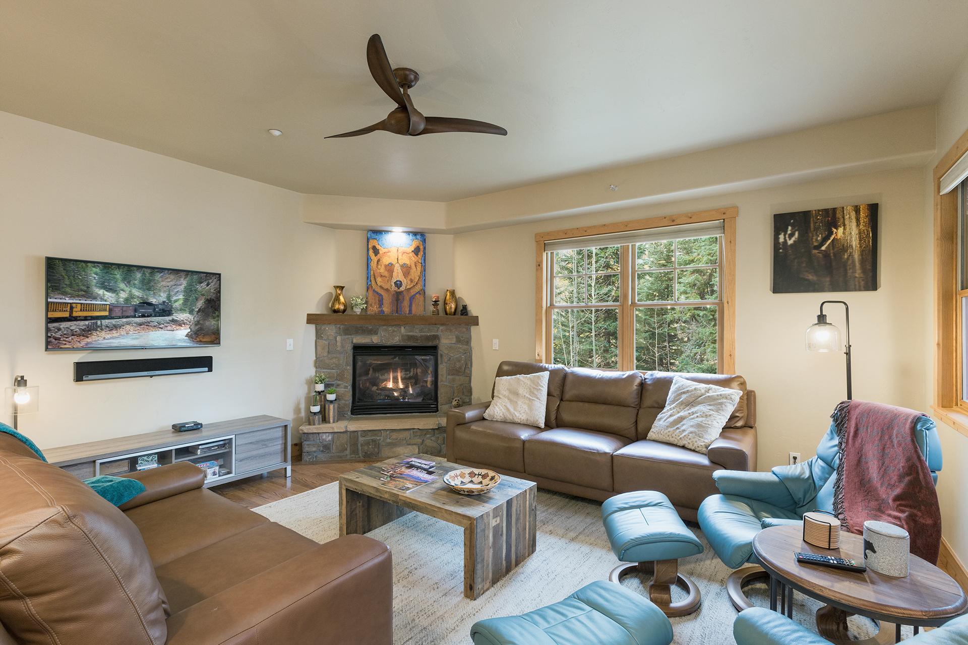 Main Living Space - Gas Fireplace, TV and Deck