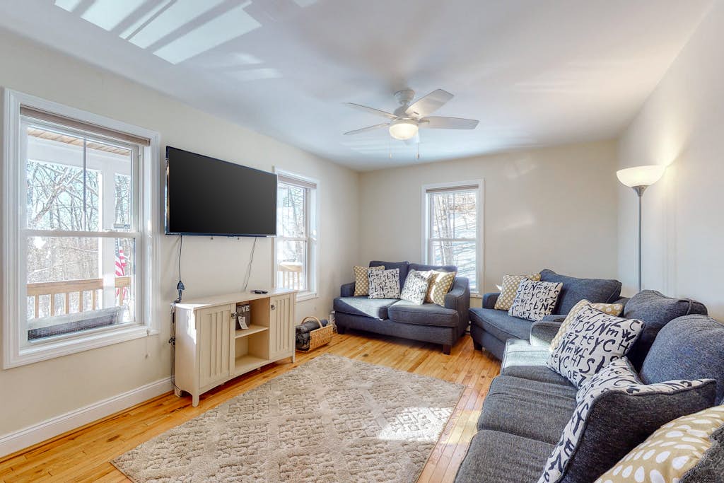 Dog-friendly home with large deck, AC, grill, fireplace & beach access