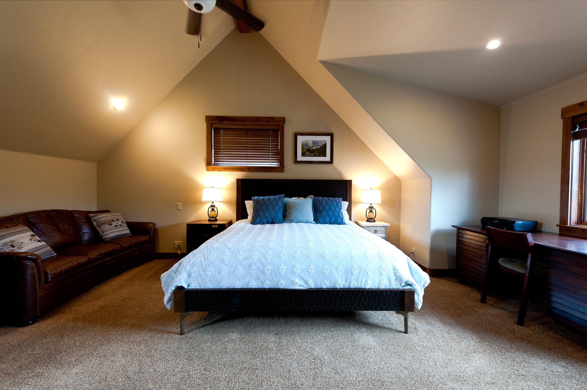 Master bedroom with king bed, TV and ensuite bath. Located on the 2nd floor.