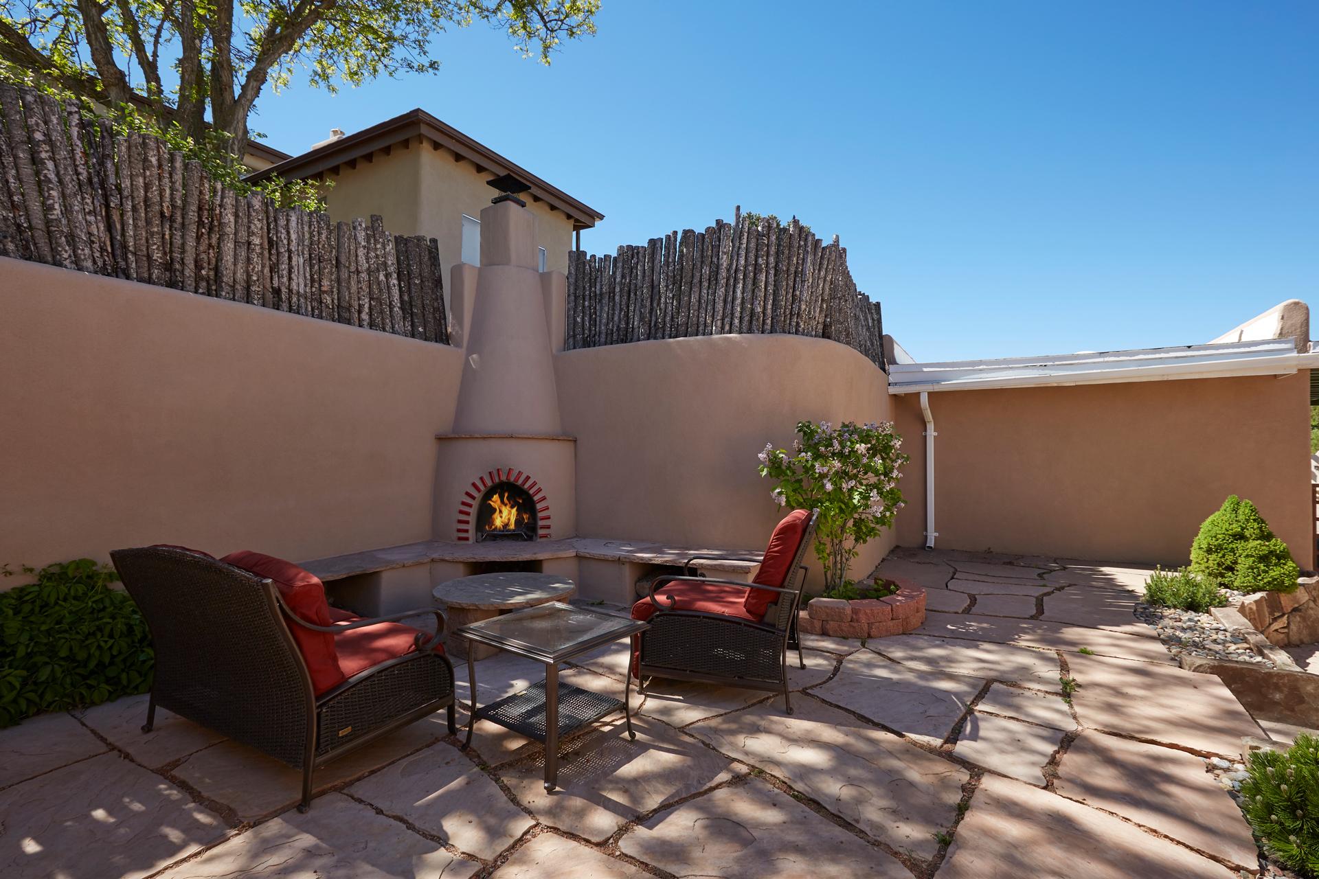 outdoor patio and kiva fireplace