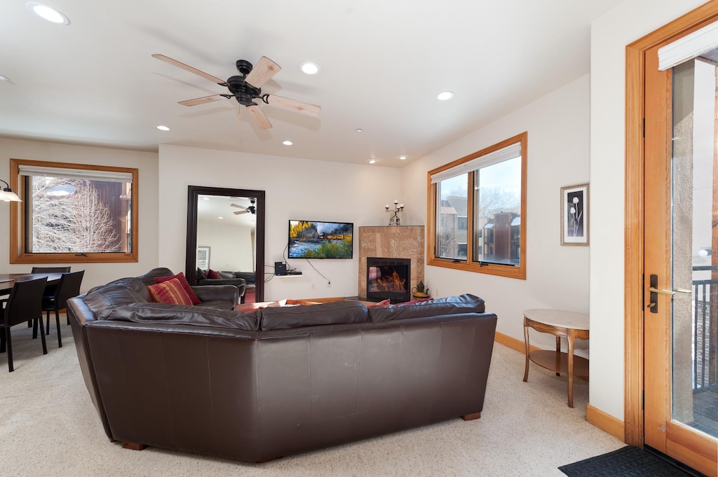 Main Living Space - Gas Fireplace, TV and Deck