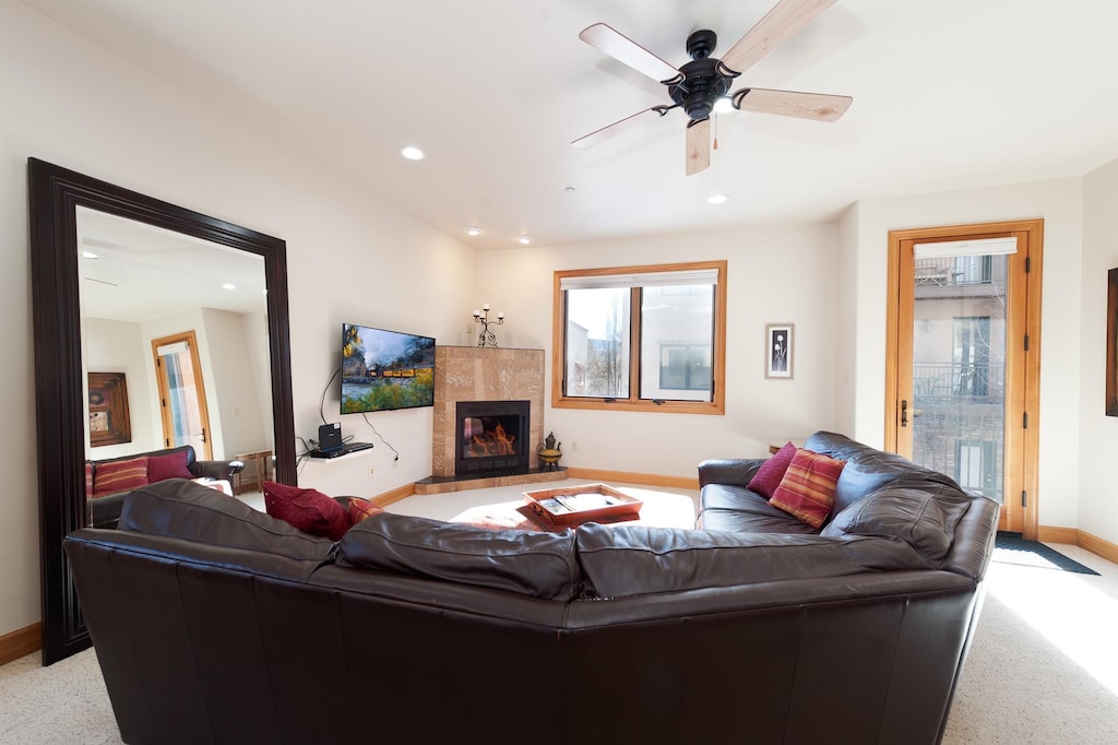 Main Living Space - Gas Fireplace, TV and Deck