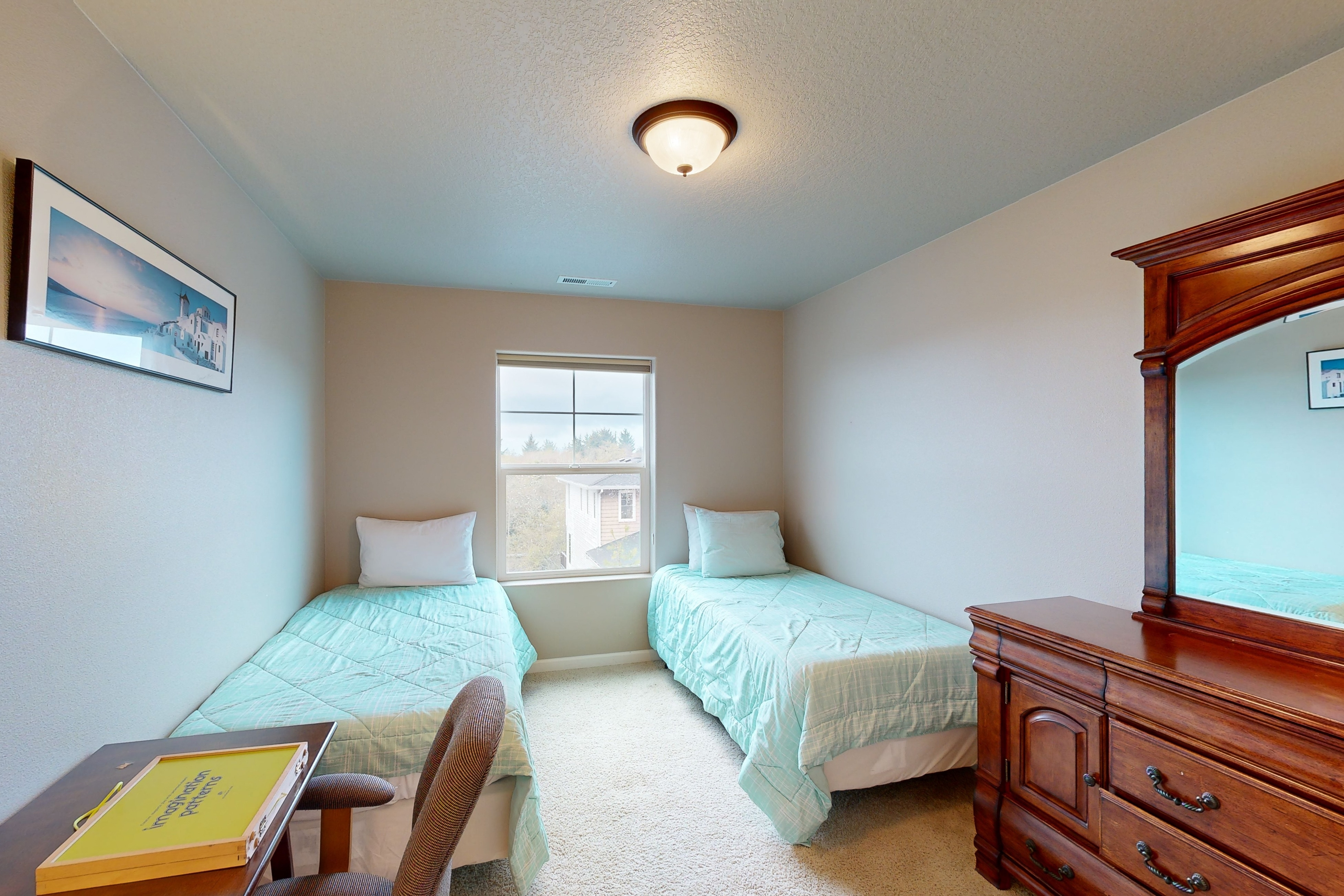 Modern Ocean Highlands home with Netarts Bay & ocean views, fireplace - dogs OK