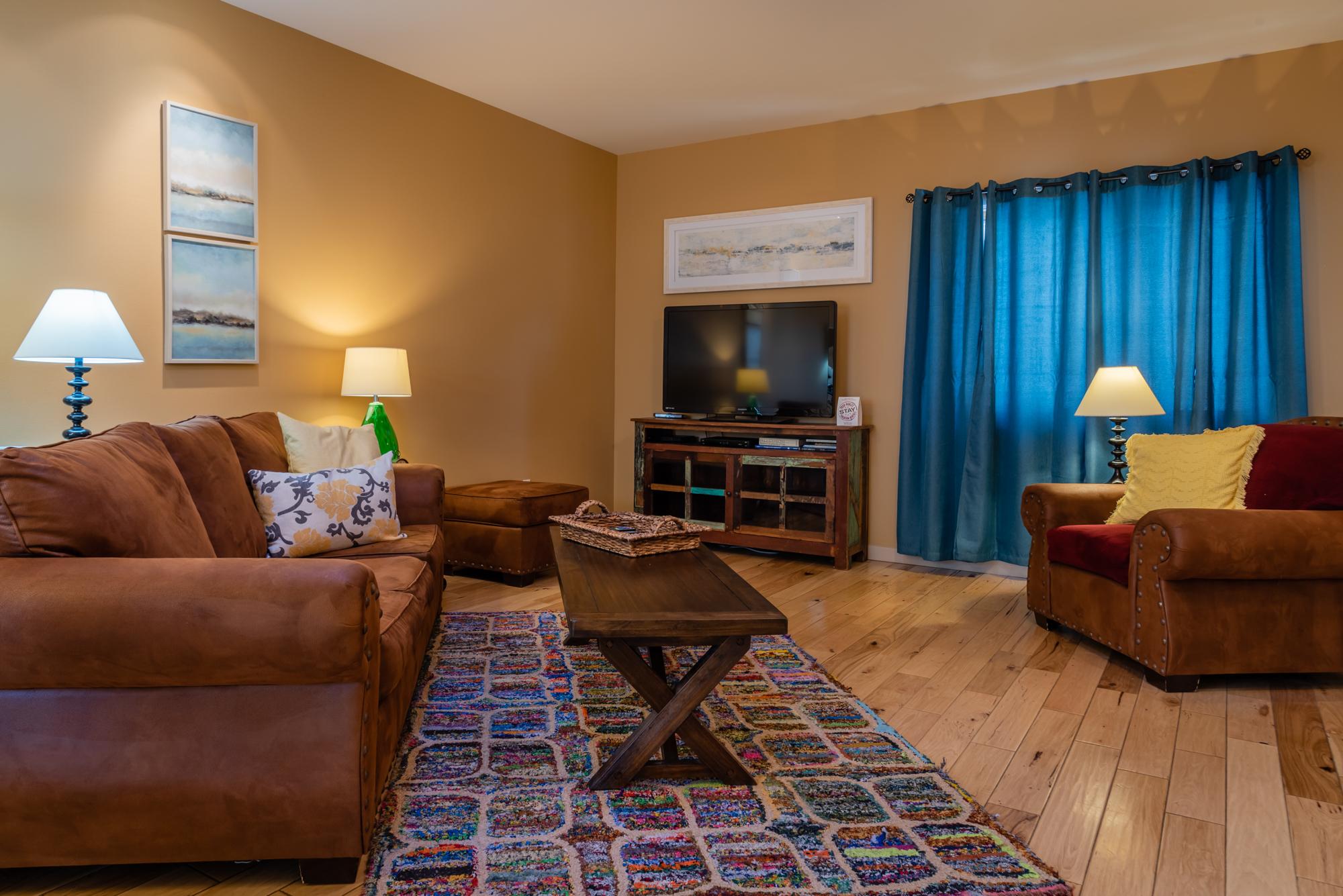 Cozy Living Room with Flat Screen TV 