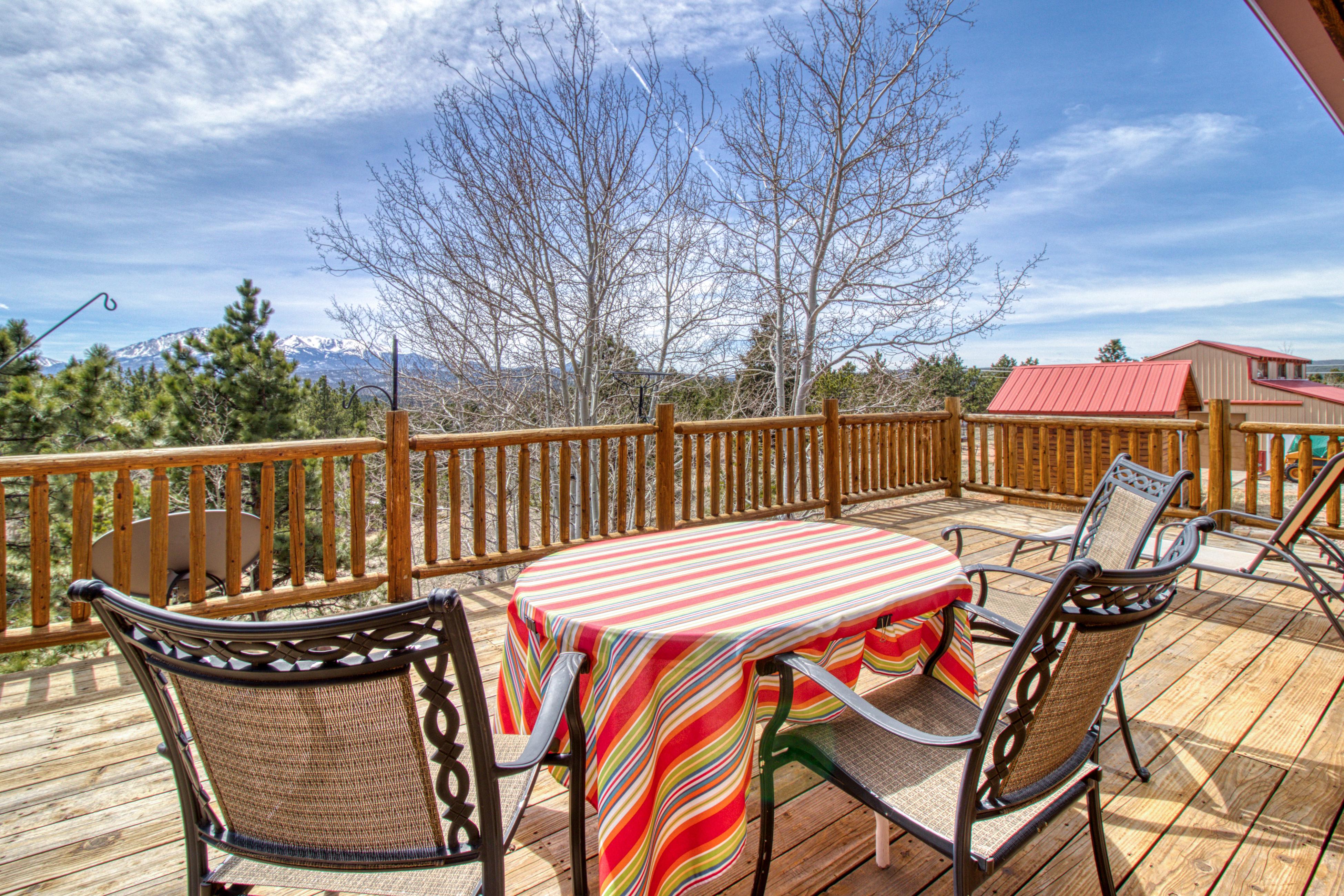 Property Image 2 - log cabin with spectacular views of Pikes Peak - private hot tub & game room