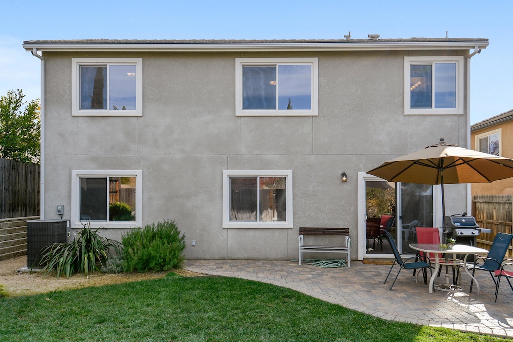 From the spacious backyard, enjoy a game of cornhole or the Prop