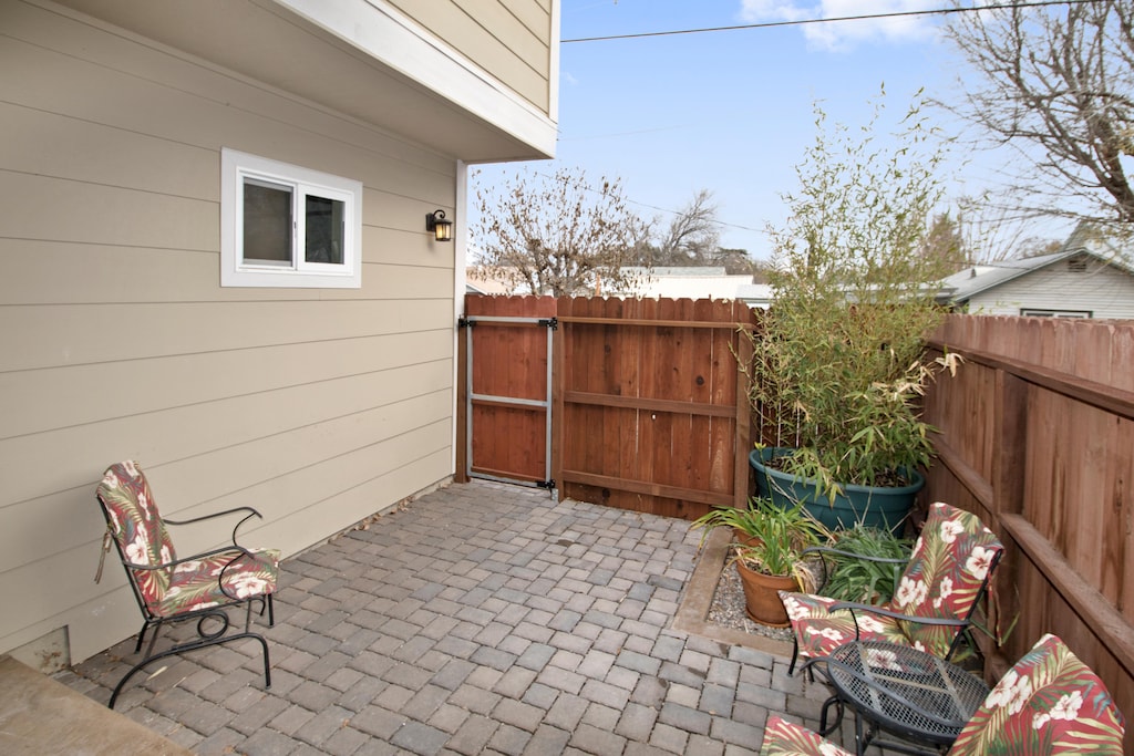 Front Gate Entry off the alley, to your private front patio with