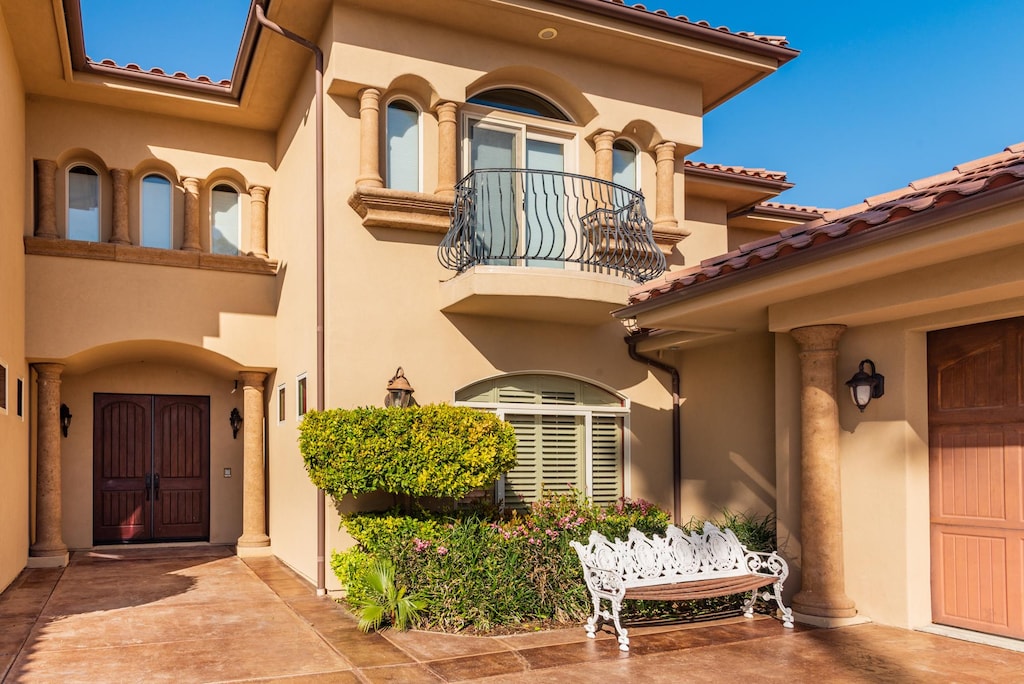 Main entry, garage is available for parking and you'll see priva