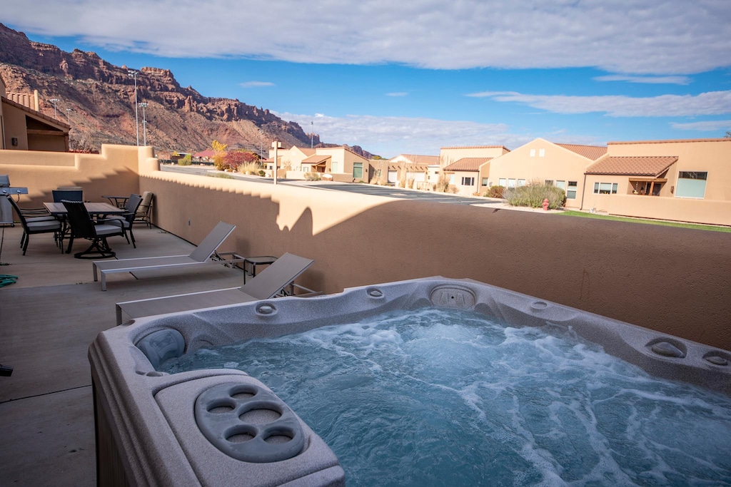 private hot tub located on enclosed patio