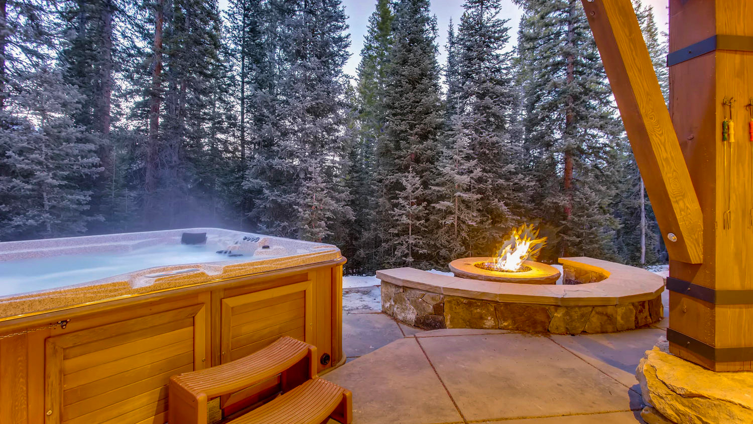 Hot tub and firepit on back patio