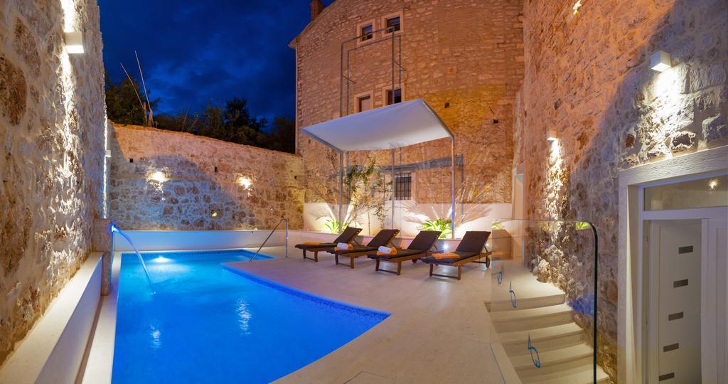 Property Image 1 - Charming Rock Villa with Pool and Jacuzzi