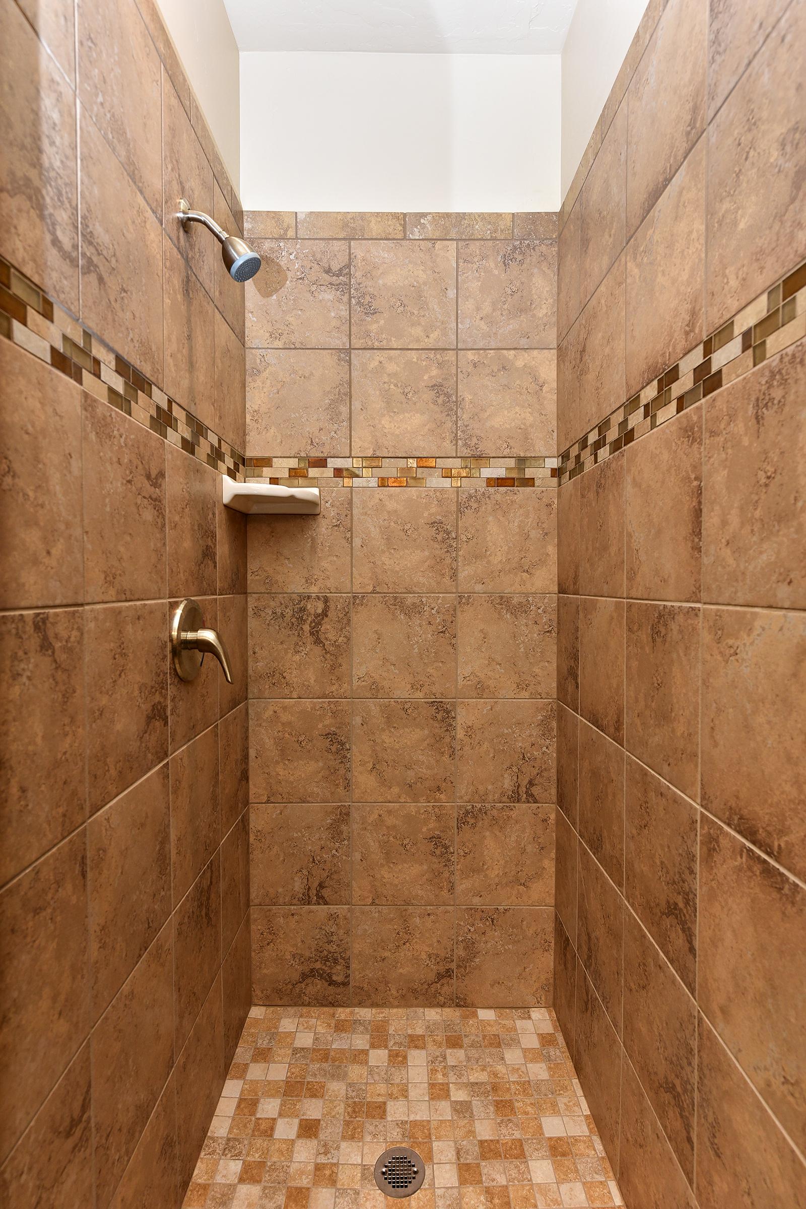 Enjoy a relaxing shower at the end of the day in the open Master Shower 