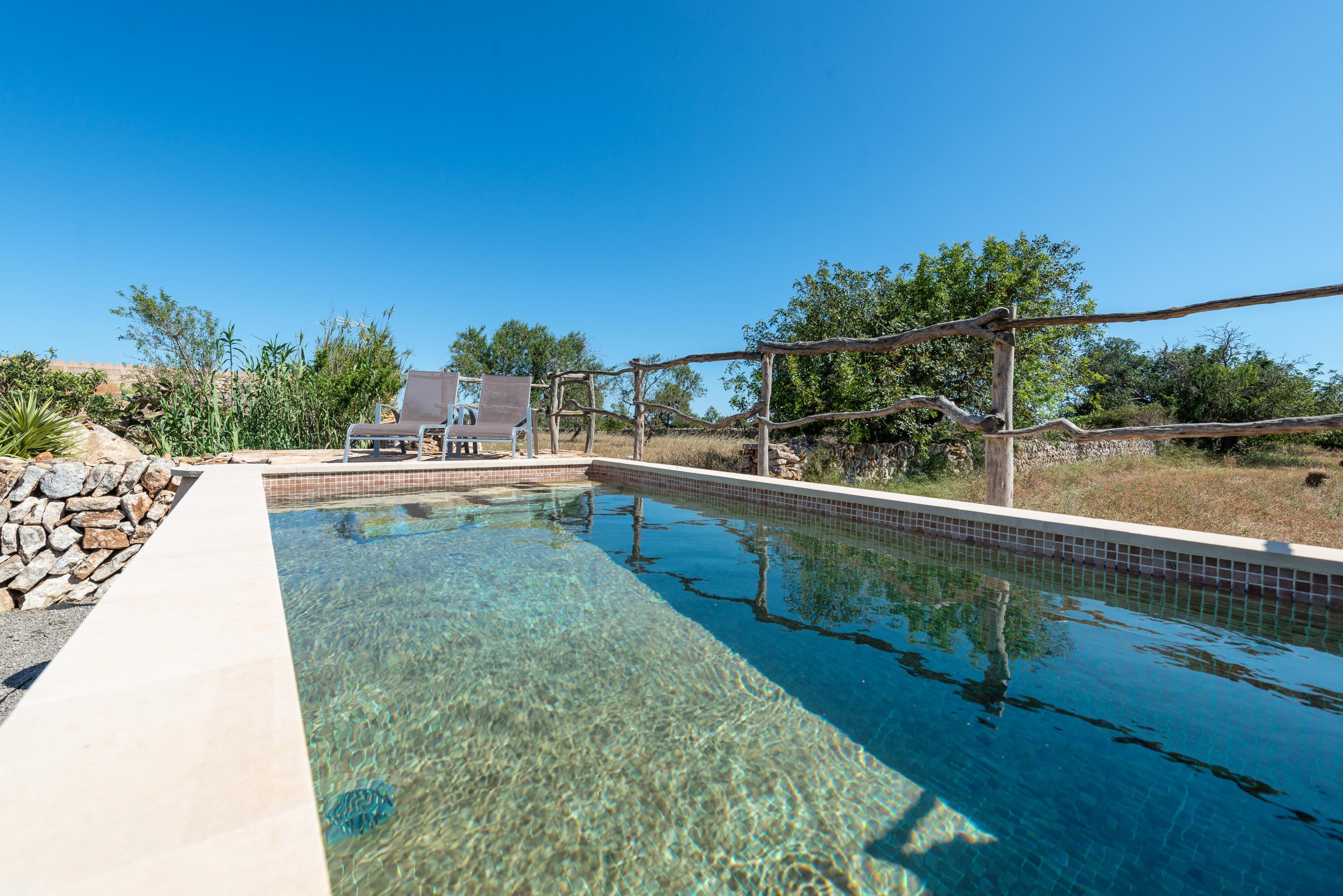 Property Image 1 - CAN MIQUEL - Well-kept country house with private above ground pool near a paradisaical beach. Free WiFi