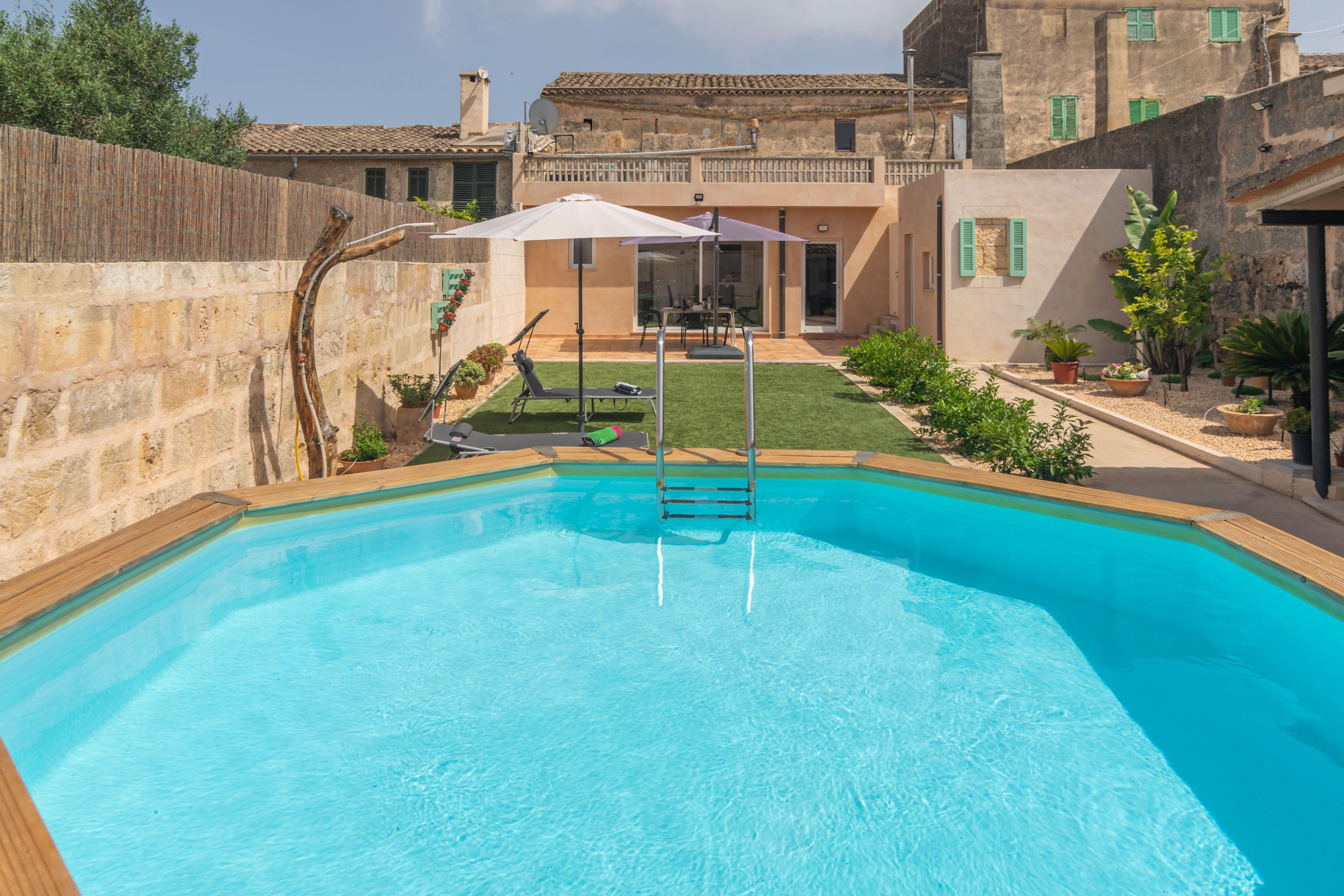 Property Image 1 - CAS PADRI PEP - Charming town house with private above ground pool. Free WIFI.