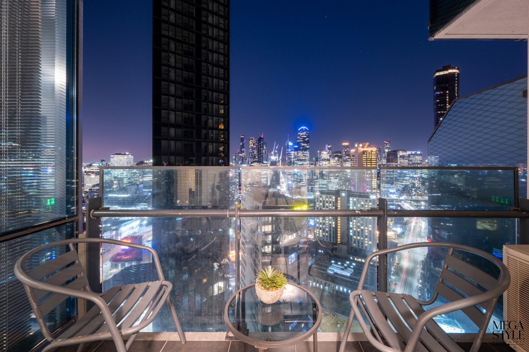 Take in the stunning 180 degree views across the city from your own glass balcony!