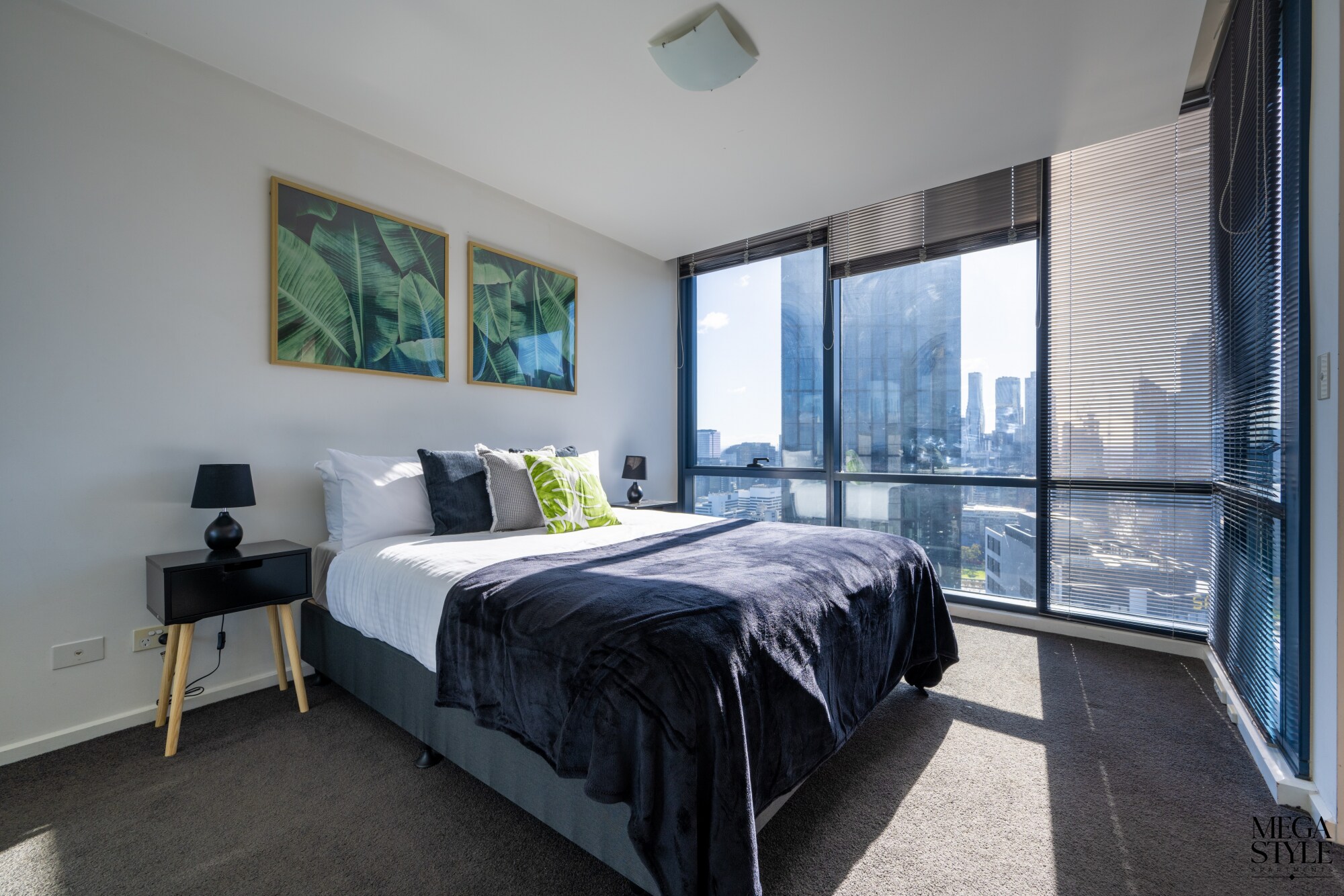 Master bedroom also features city views from the floor to ceiling windows