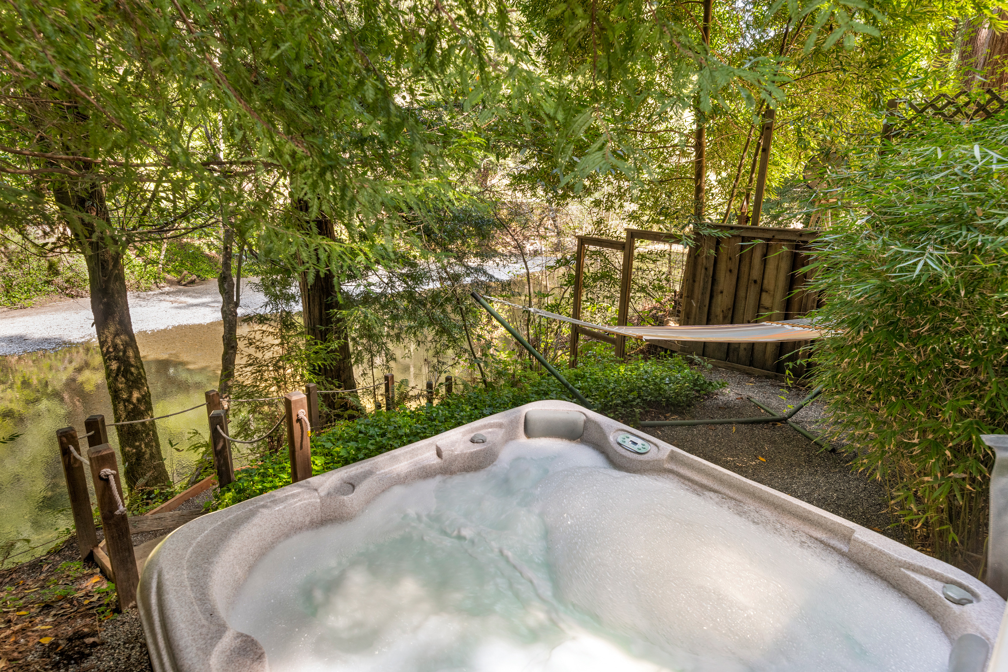 Hot tub with creek views