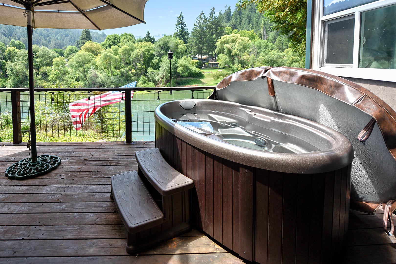 Romantic 2 person hot tub overlooking the river.