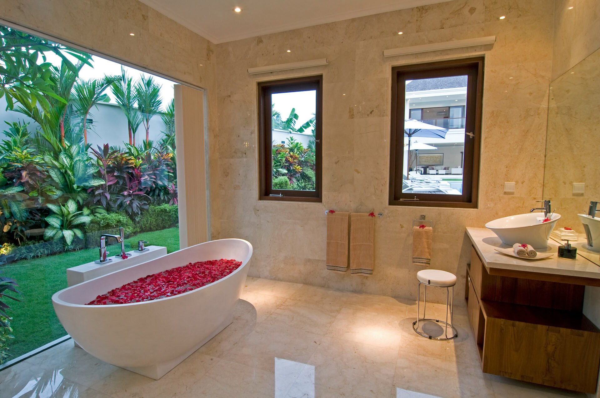 Romantic set-up bathroom also providing panoramic garden view 