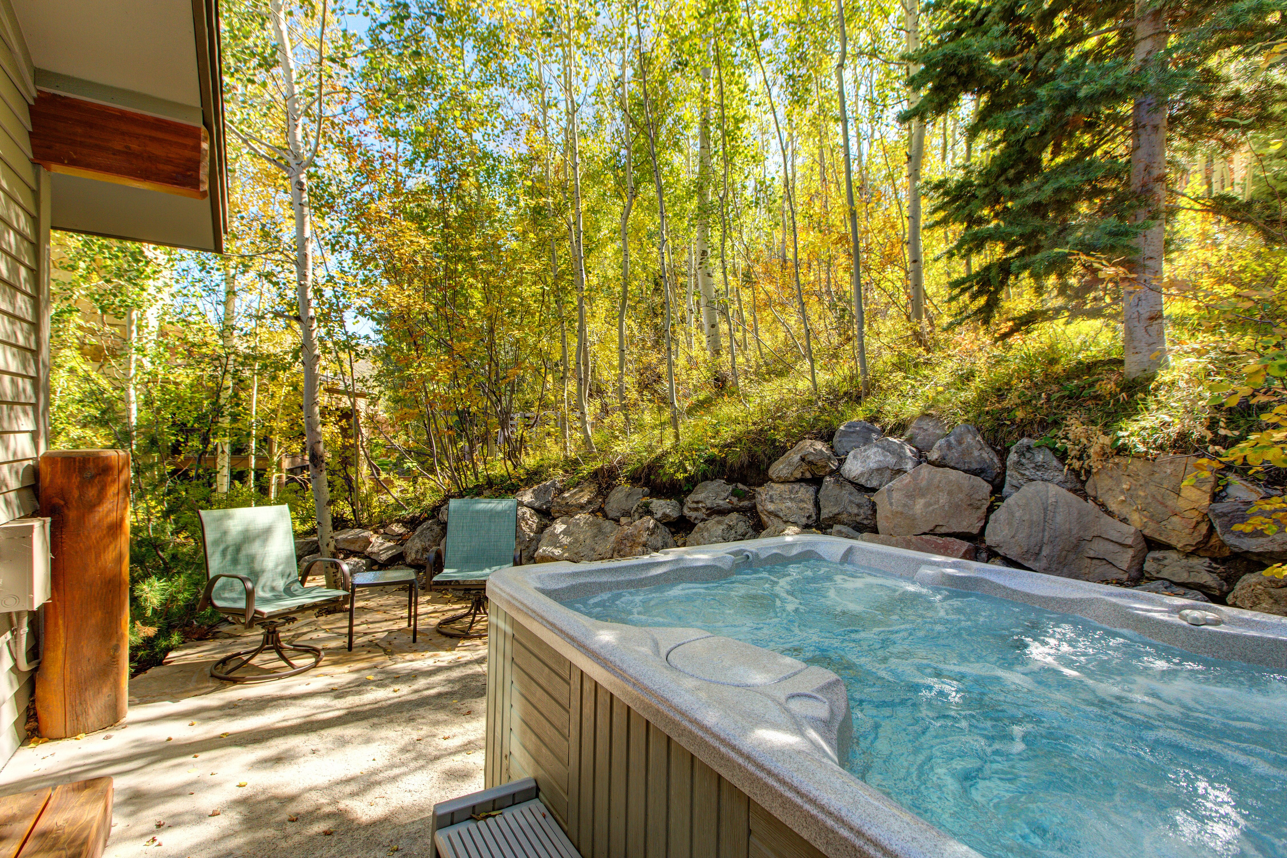 Private Patio with a Hot Tub Off the Upper Level Grand Master Bedroom - Beautiful Wooded Views
