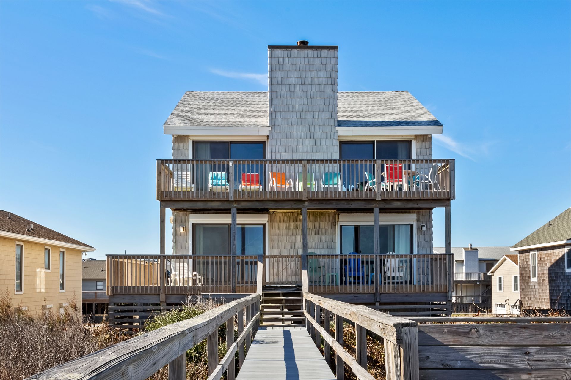 Back exterior of this classic beach front home