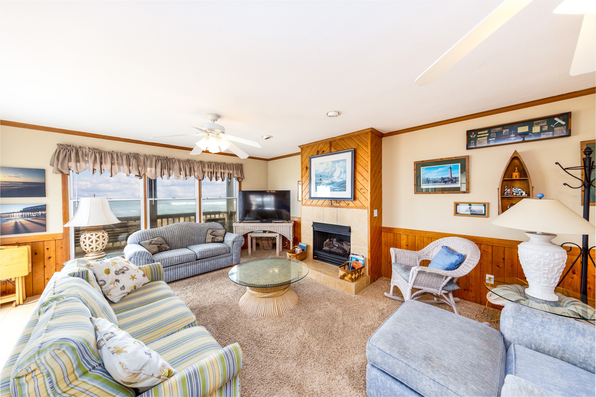 Mid-level living area with ocean views. (Please Note - The fireplace is not for guest use.)