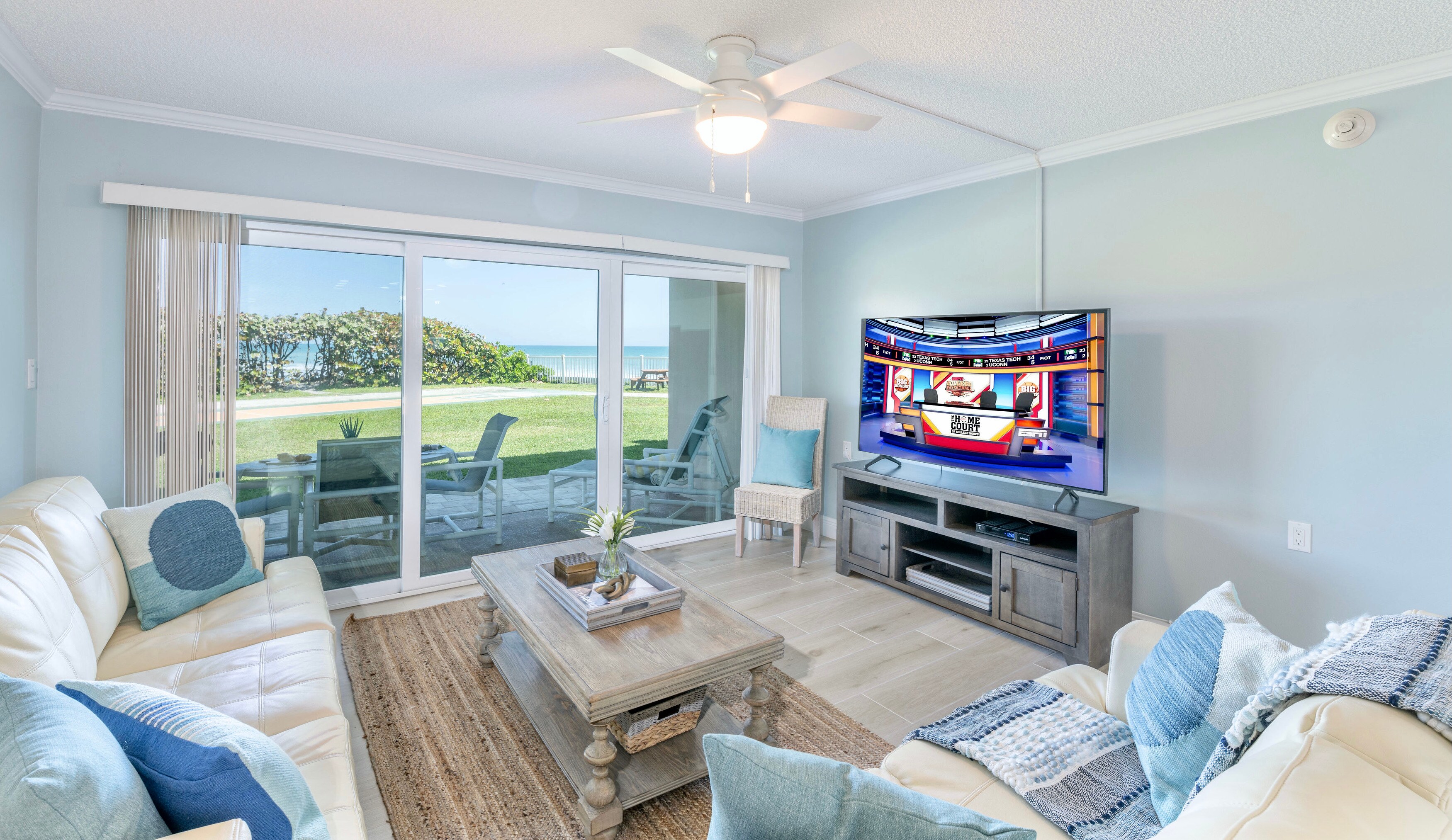 Walk right out to the ocean! Enjoy views of the ocean or your big screen TV right from your living room.
