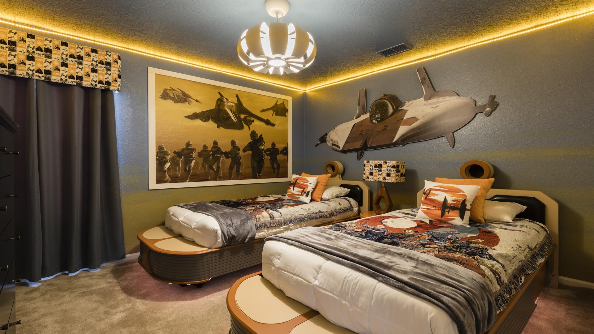 Kids will love the upstairs bedroom with a cool Star War theme