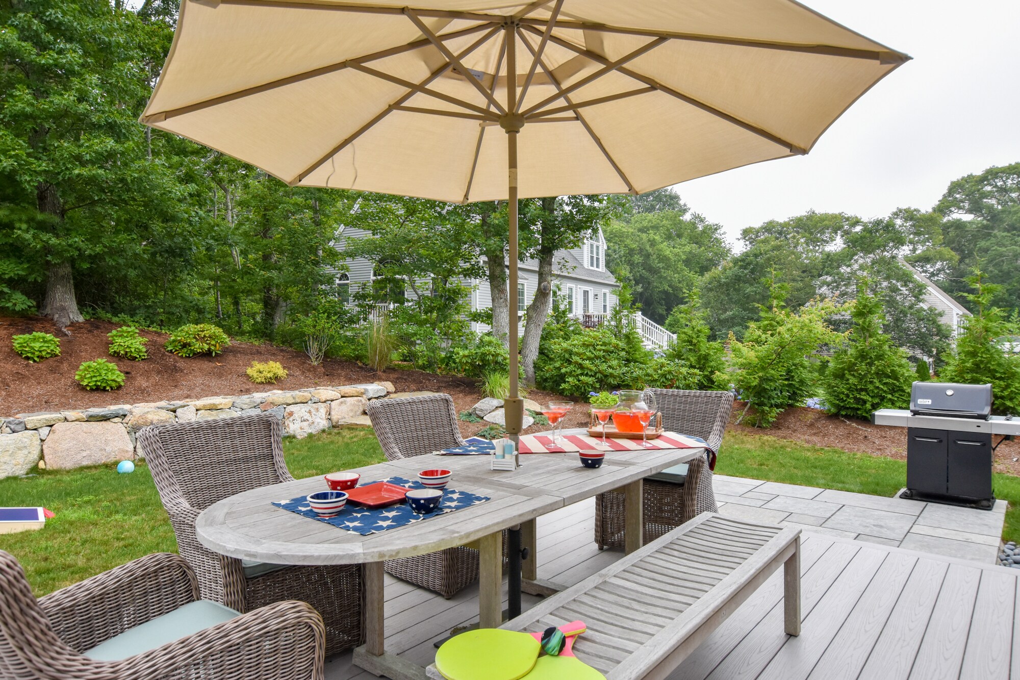 Dine alfresco on the deck with table seating for six.