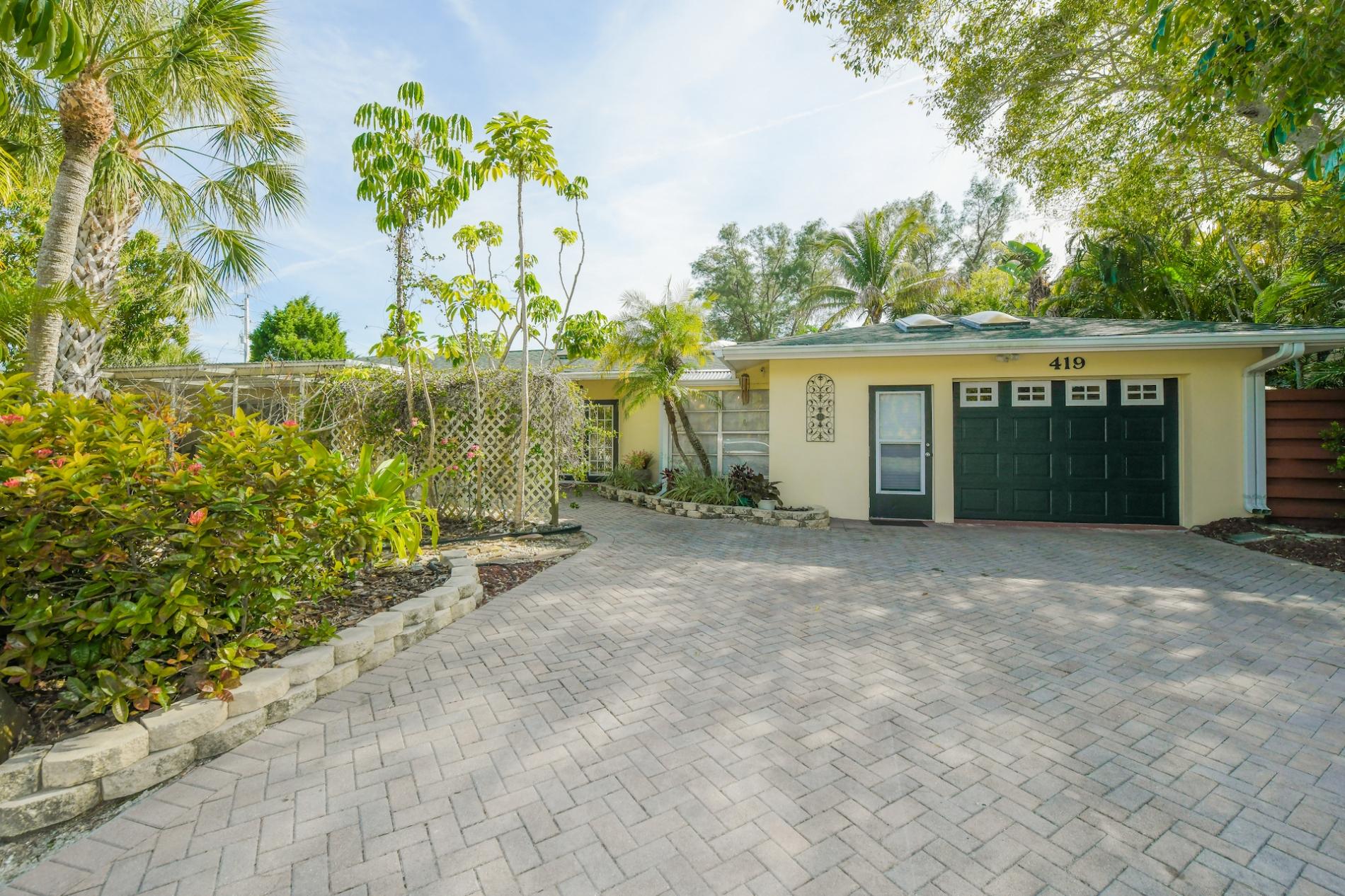 Property Image 2 - Island Time - Home w/Enclosed Lagoon Style Pool & Spa, Walk to Beach, Boat Dock, Bikes!