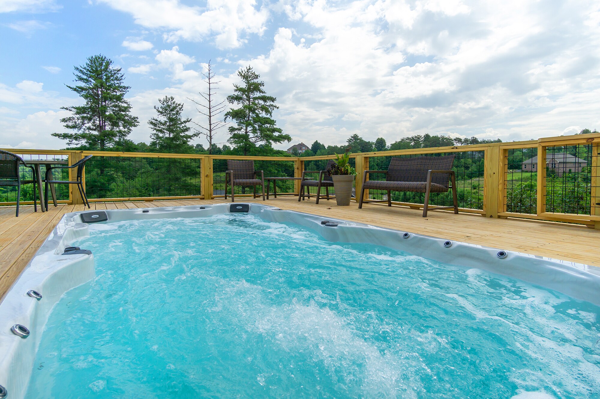Property Image 2 - Weekend with friends & family! Movie room~Swim Spa~Hot Tub~Firepit~Sleeps 18~minutes to Asheville!