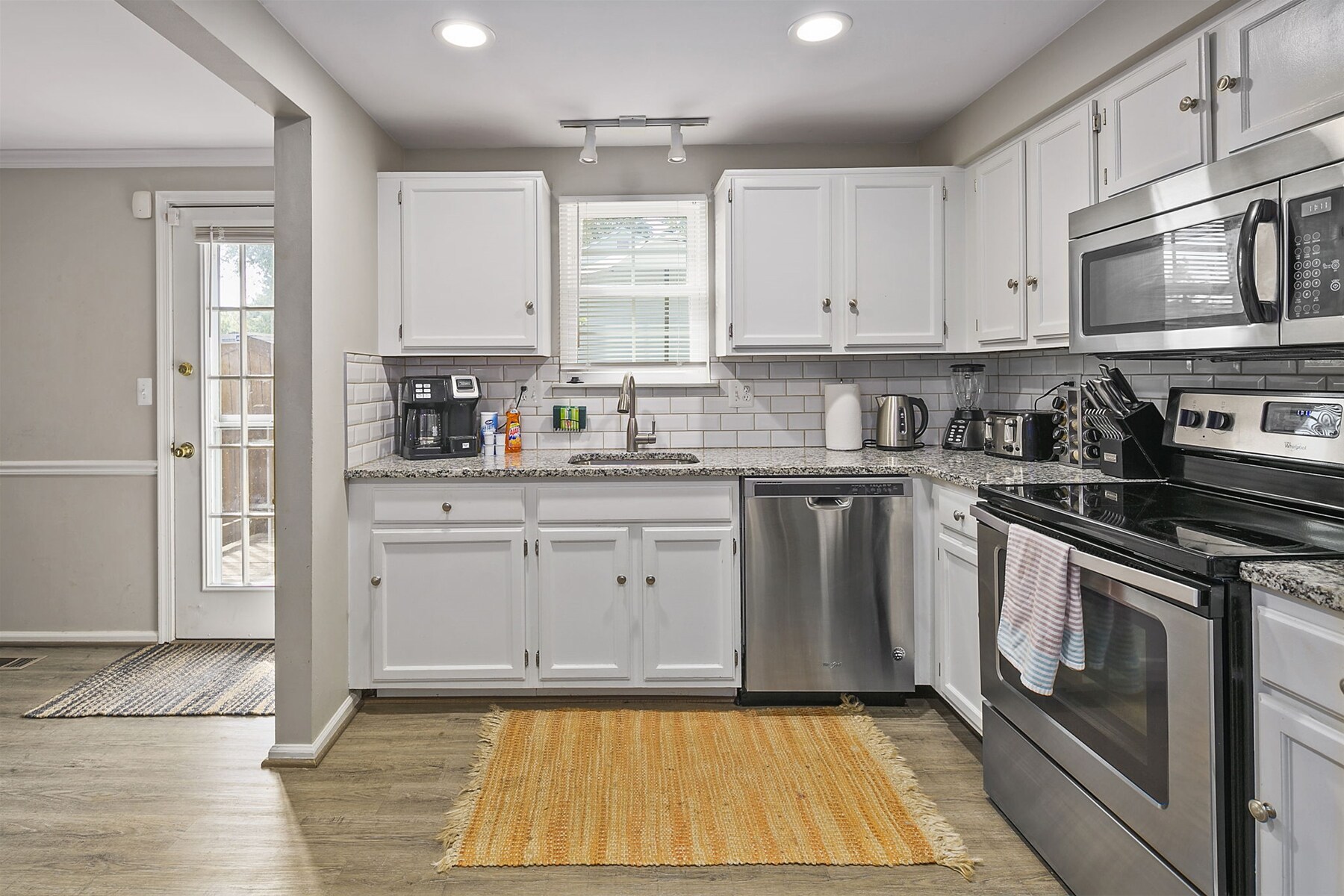 Fully-equipped kitchen with appliances & cooking essentials