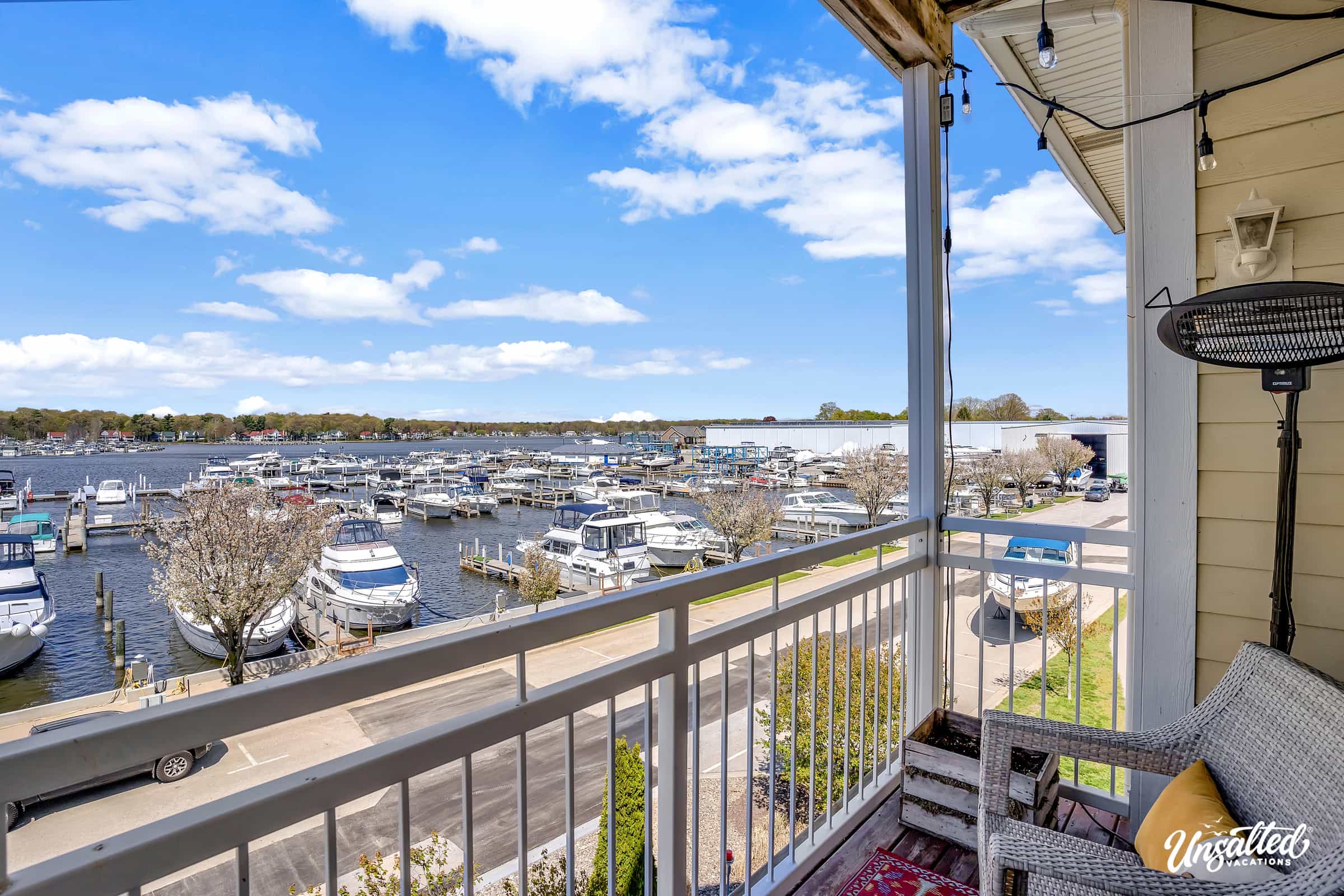 Large Balcony Looking out over Spring Lake and Marina
