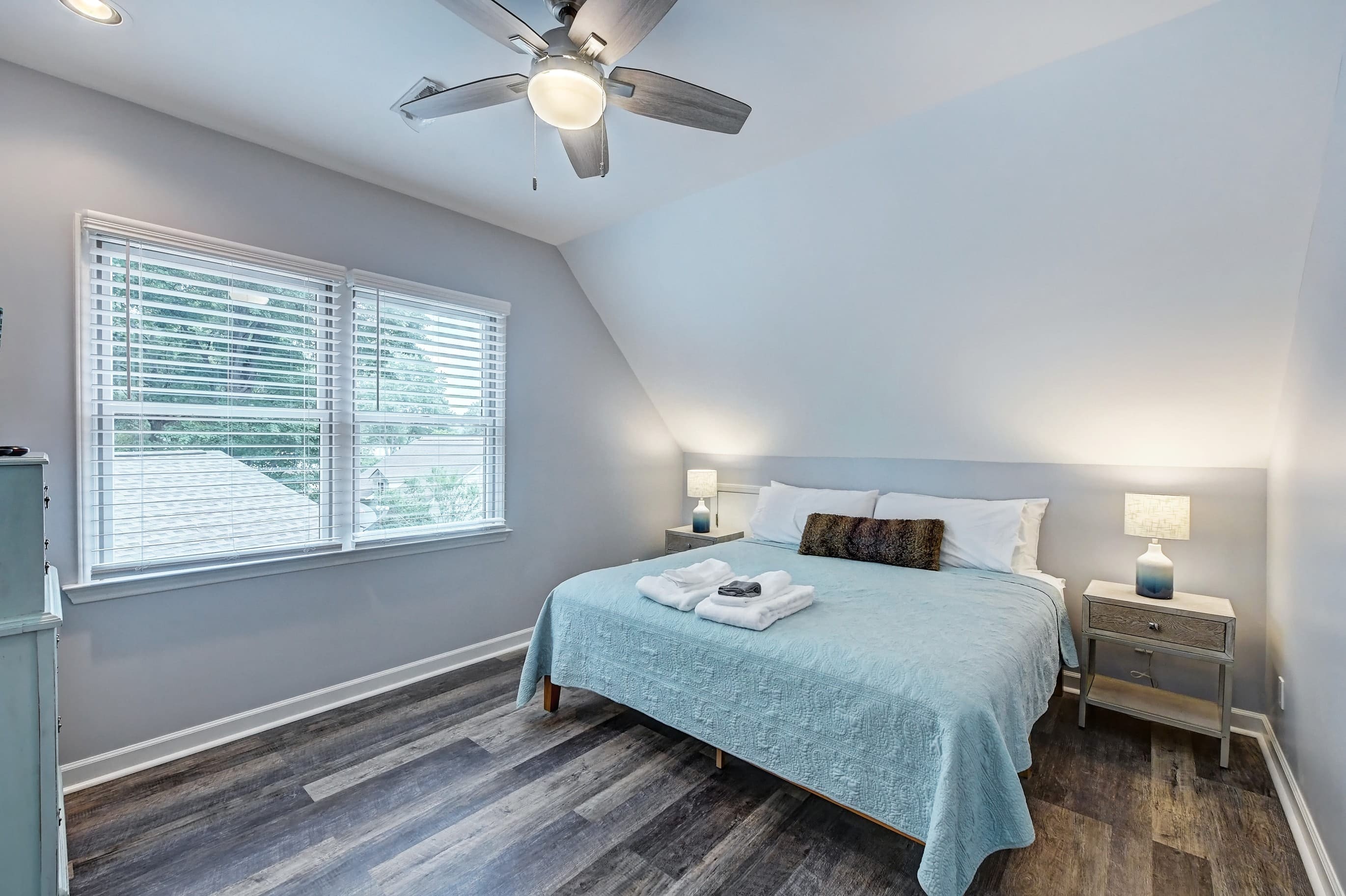 Upper Level - Bedroom 2 features a king bed. Upper Level - Bedroom 2 features a king bed.